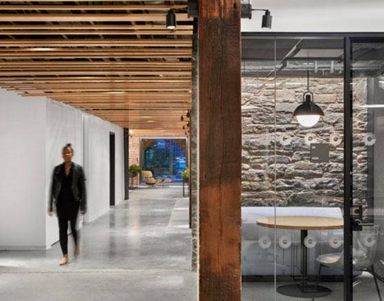 united technologies digital exhibiting biophilic design in the workplace with a natural stone wall and wooden textures